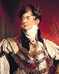 Shows a photograph of a head and shoulders portrait of the Prince Regent wearing lavish period clothing. He has short brown hair and is pictured against a regal red curtain.